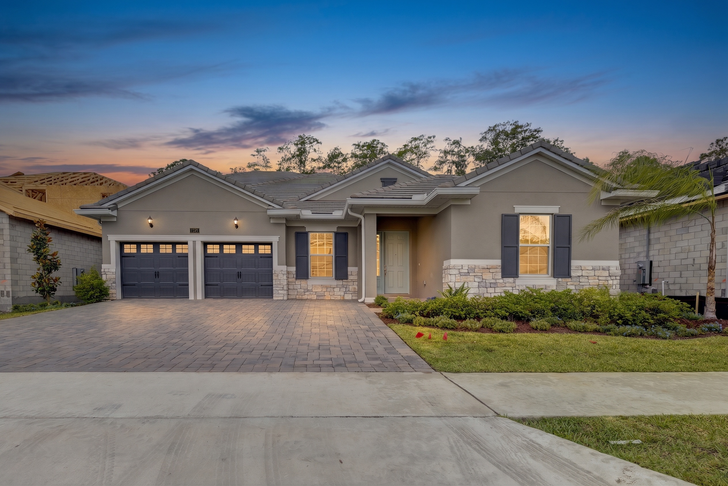 Single-story single family home at Windermere, FL at twilight