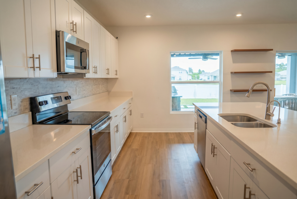 Virtually staged kitchen with white cabinets, stainless range and floating shelves